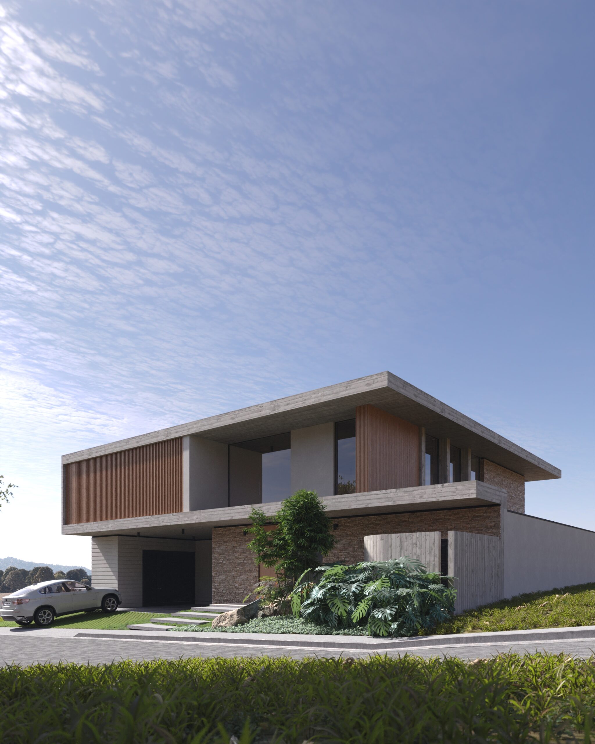 Perspectiva exterior de la Casa JLR resaltando la honestidad constructiva y el balance de materiales.